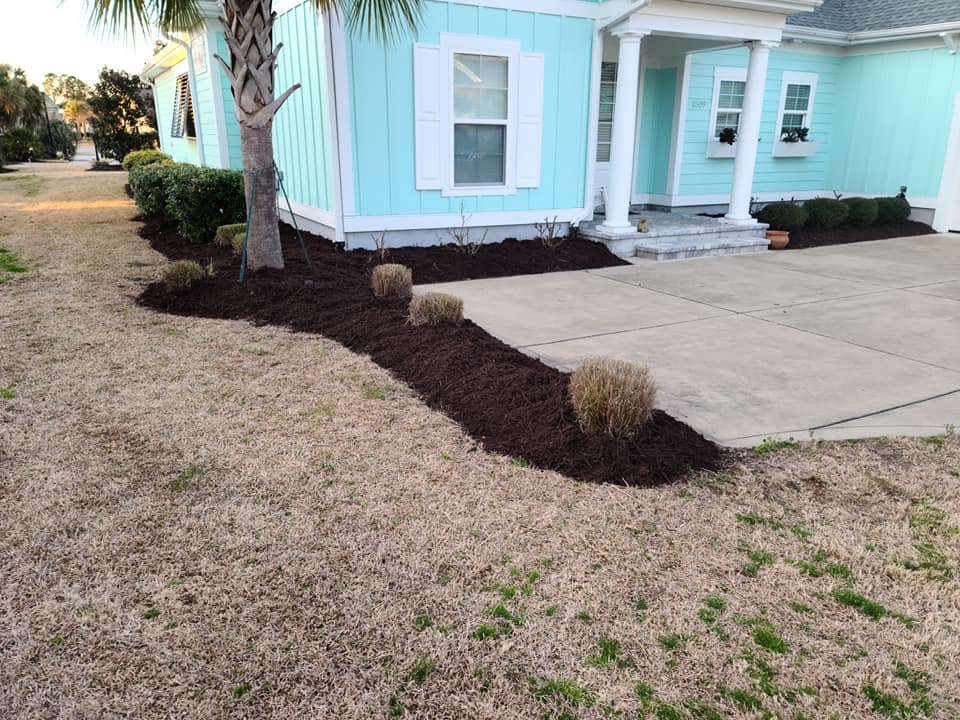 Top dress mulch, and trim grasses in North Myrtle Beach,SC 29582