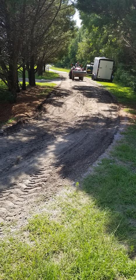 Longs, regraded driveway removing pot holes and resmoothing surface
