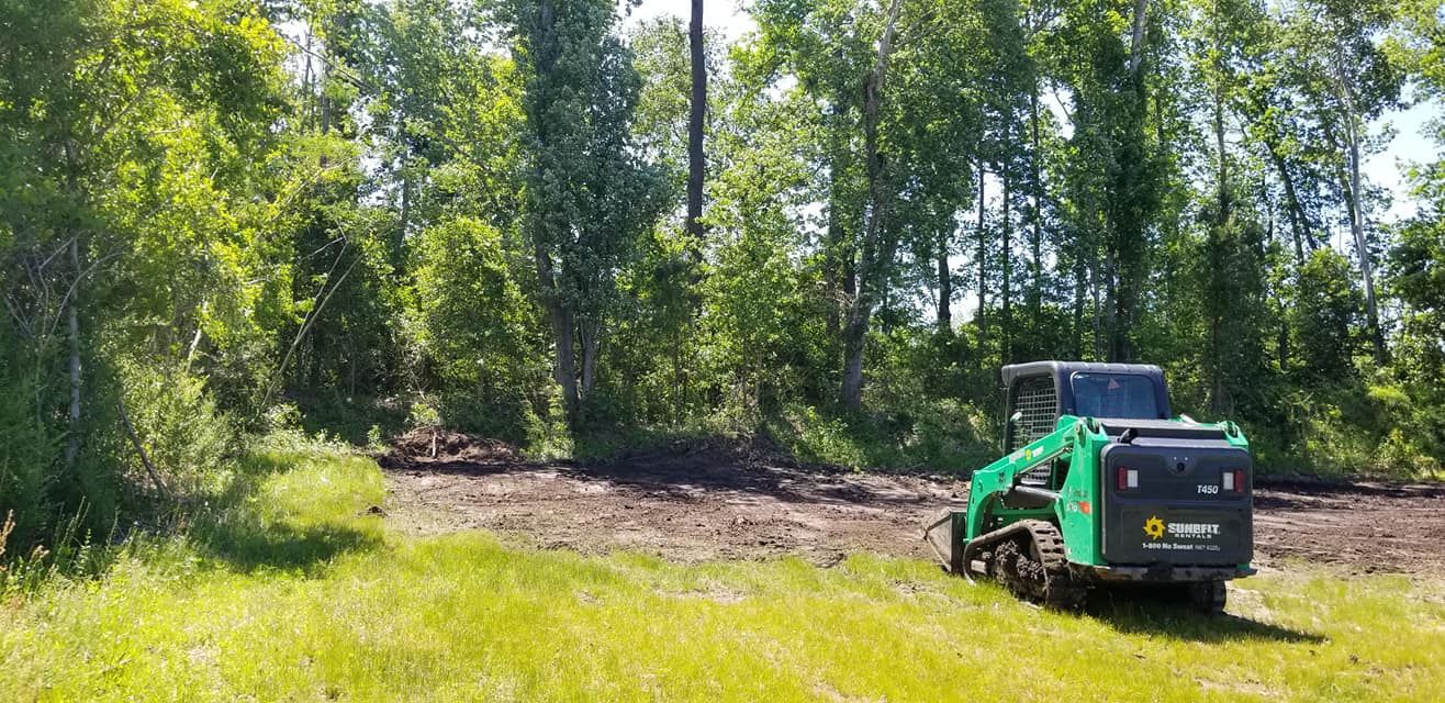 Grading the ground in Little River,SC 29566